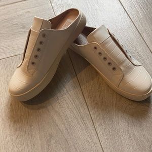 White raven cream shell slides.